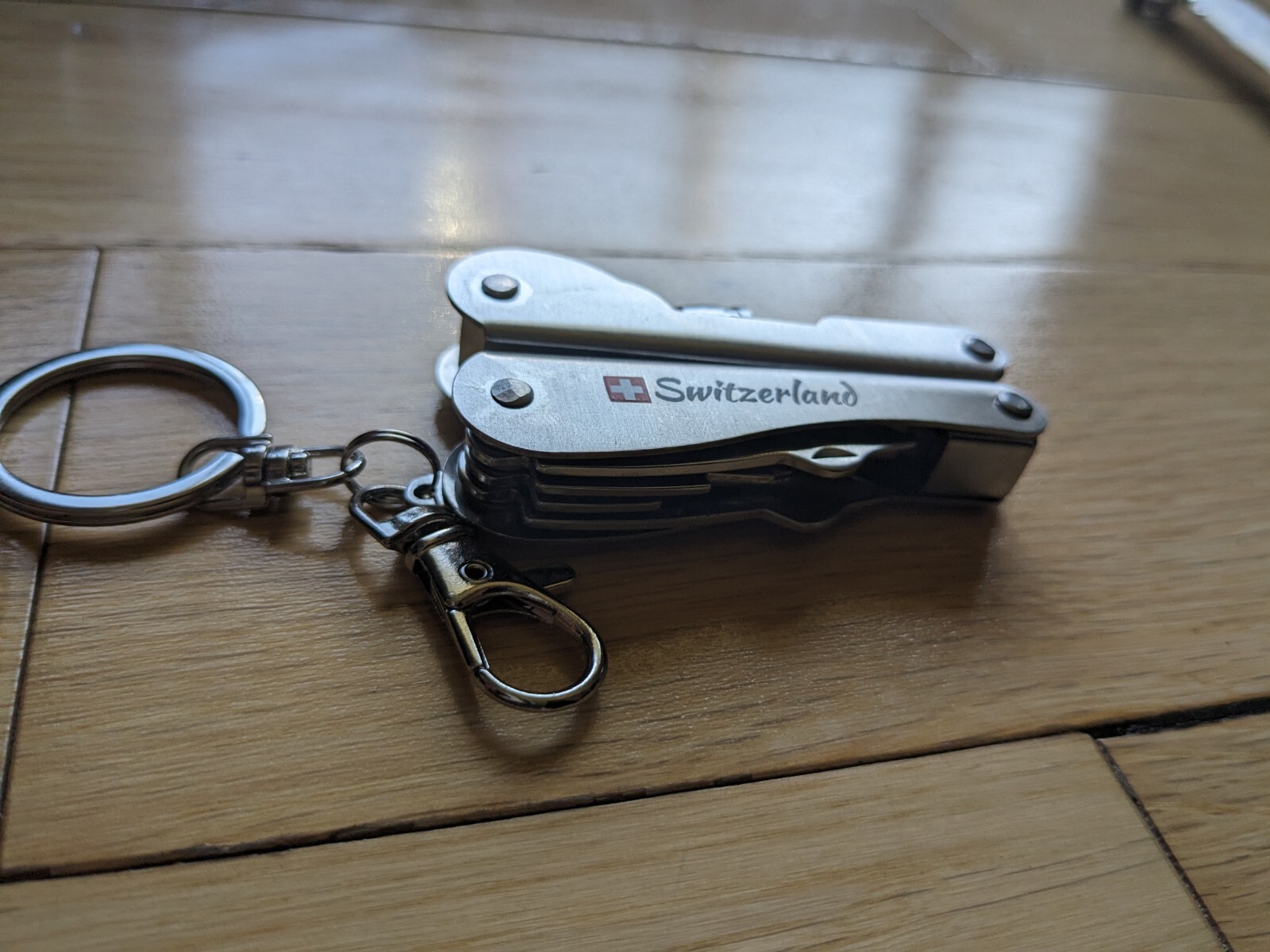 Swiss-Made Foldable Pocket Multi-Tool Stainless Steel w Pocket Clip. 8 Functions