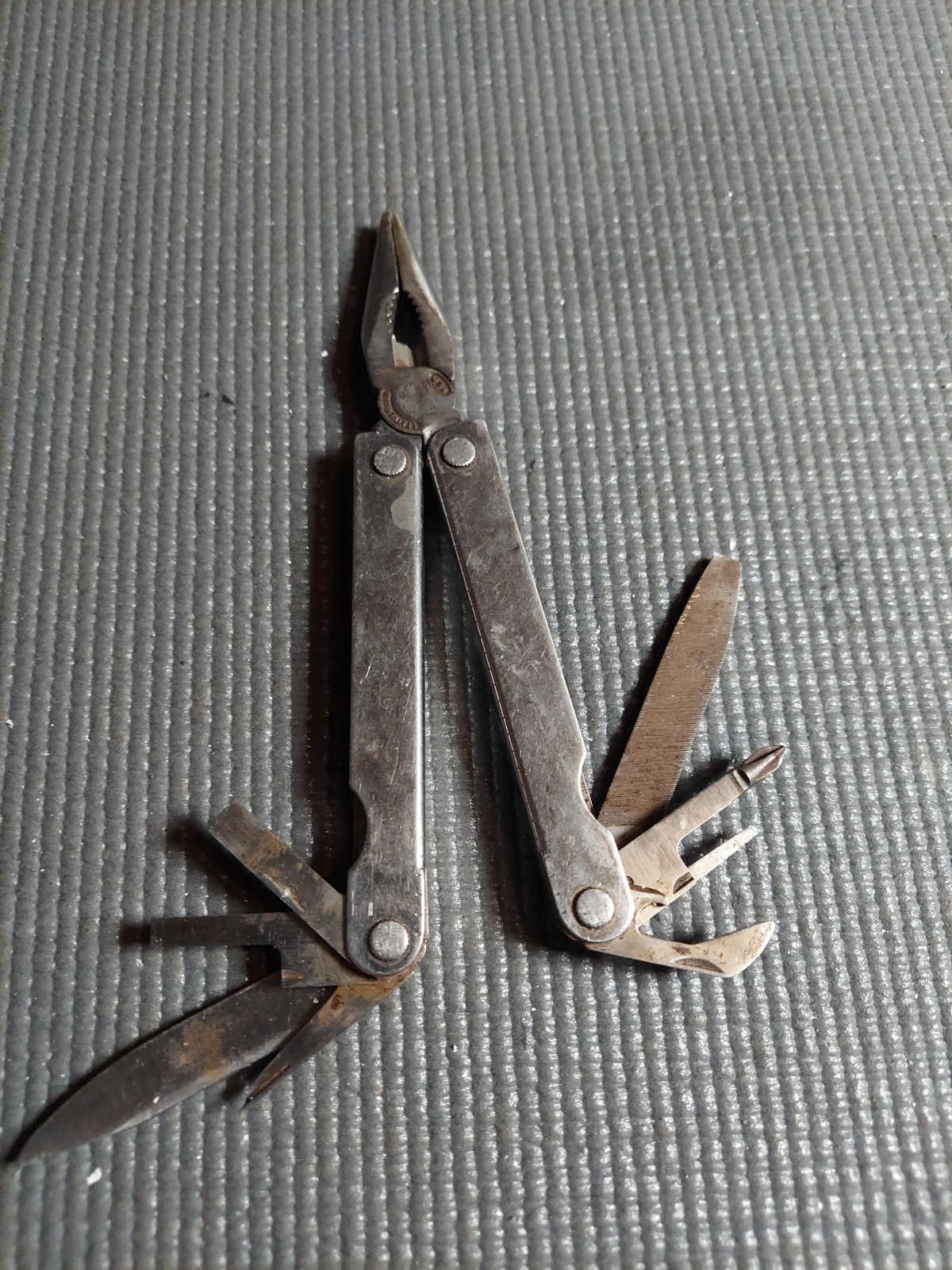 Original vintage Leatherman multi-tool, U.S. registered trademark (TM 1325473).