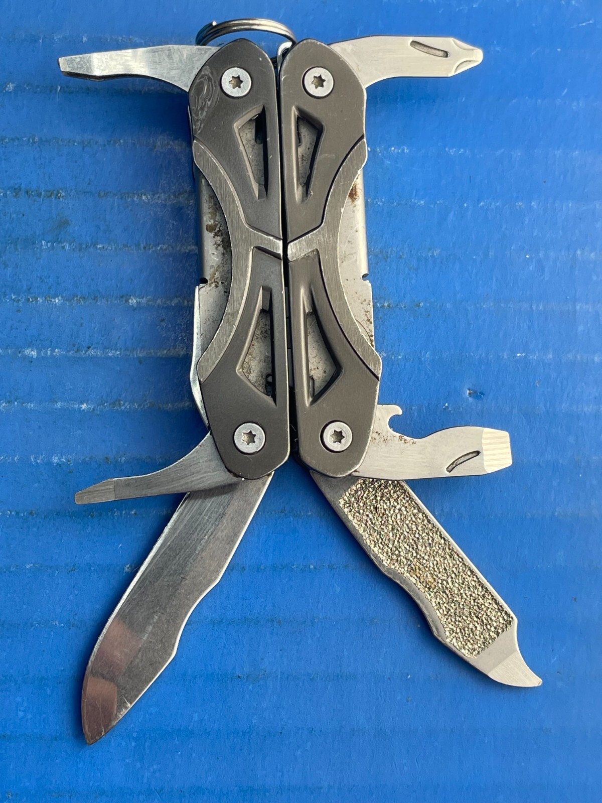 Gerber Clutch Multi-Tool Knife – Nail File – Pliers – Screwdrivers- Tweezer