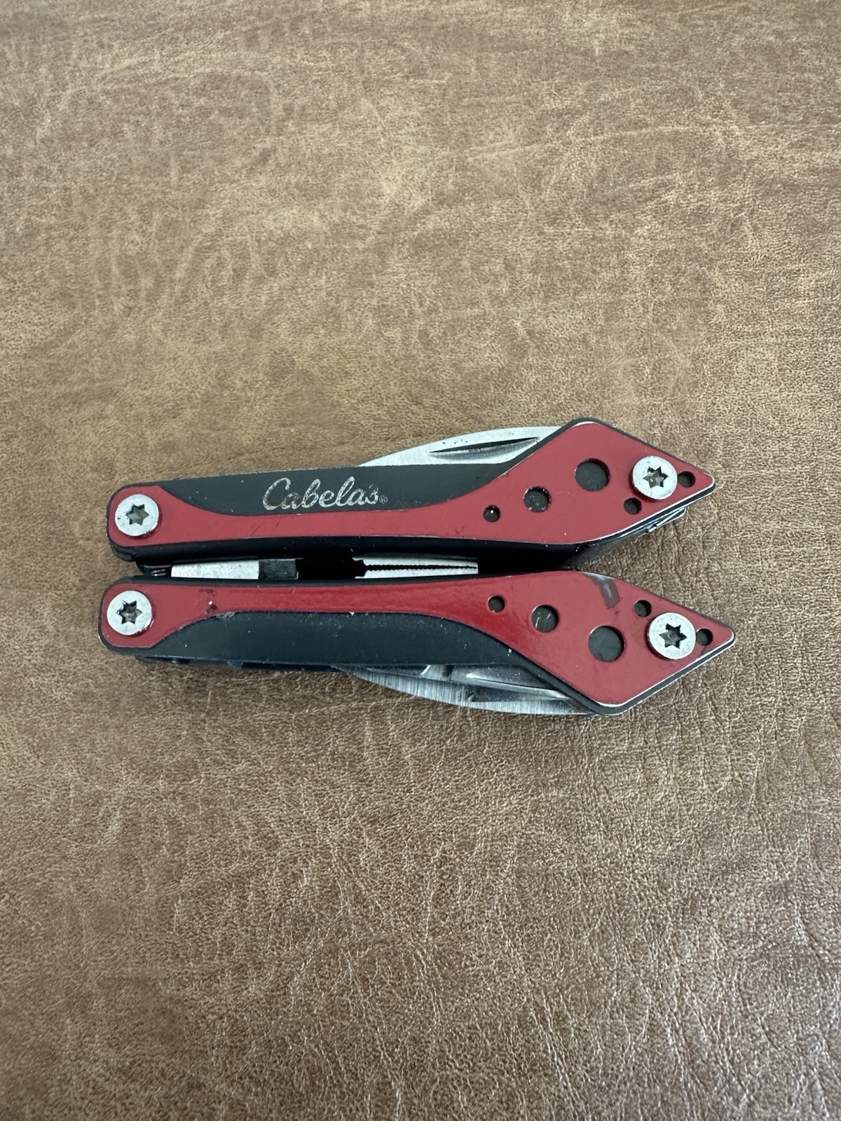 Cabela’s 4-1/2″ Multi-Tool in Red and Black with 7 Tools In One