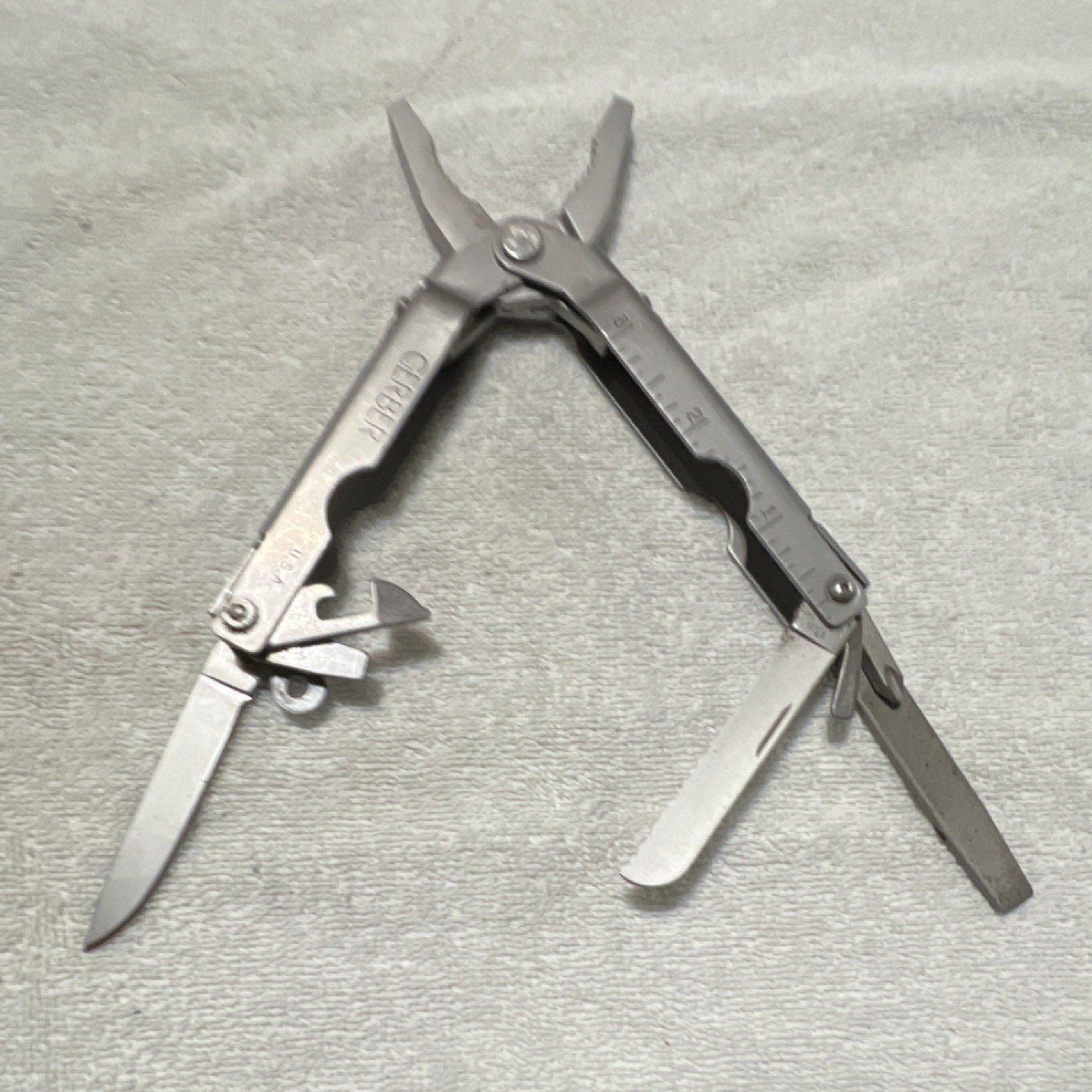 Gerber Stainless Steel Multi-Tool 7-in-1 Pliers Knife File Can Opener Ruler