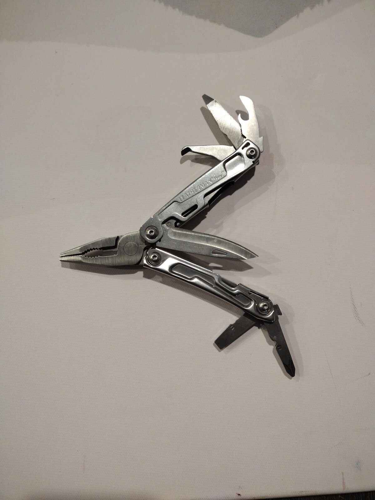 Leatherman REV 14 Tools Multi-Tool – Stainless Steel with Nylon Sheath Excellent