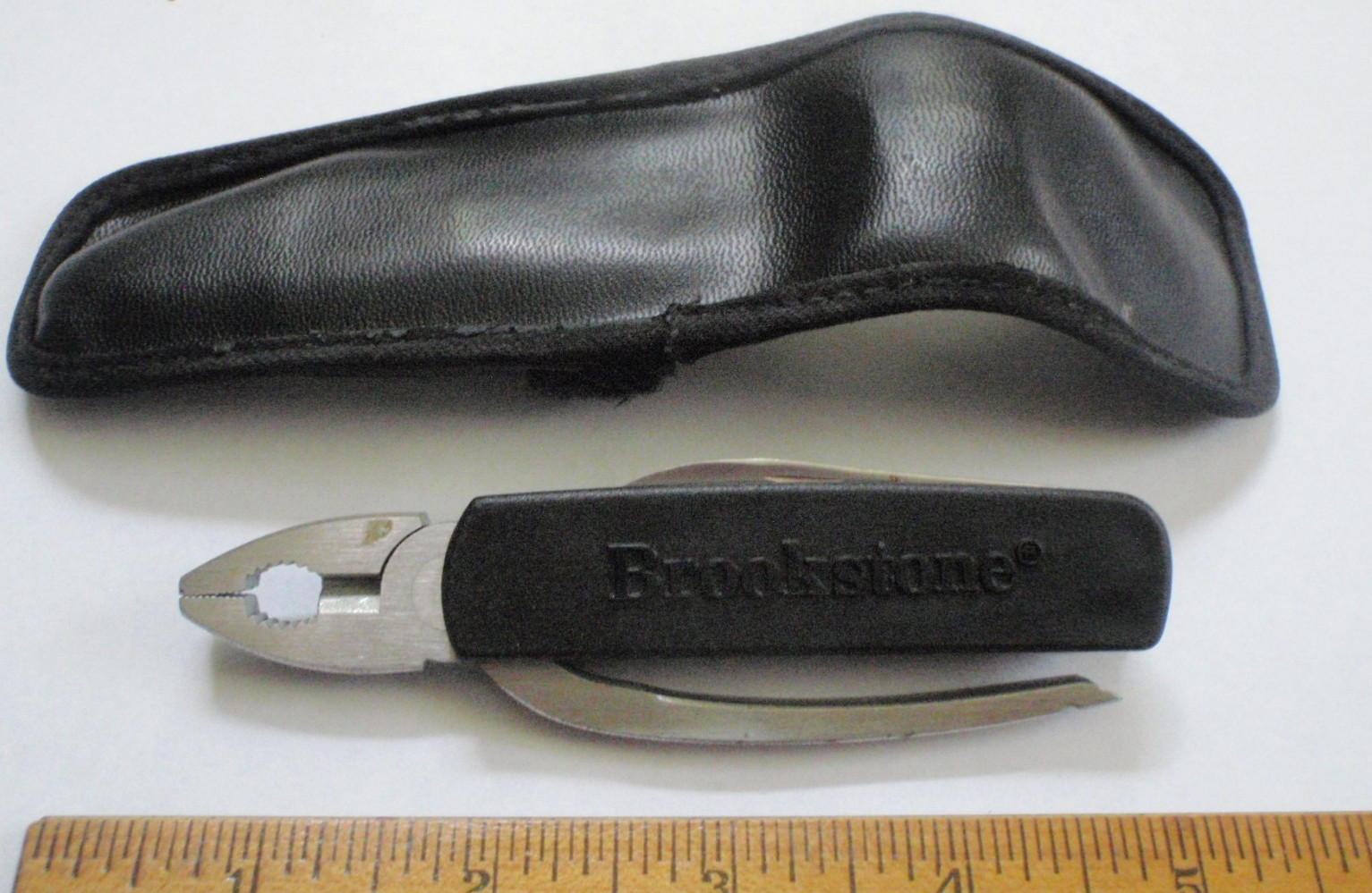 Brookstone Multi-Tool Stainless Steel Pliers wirecutter saw blade can opener