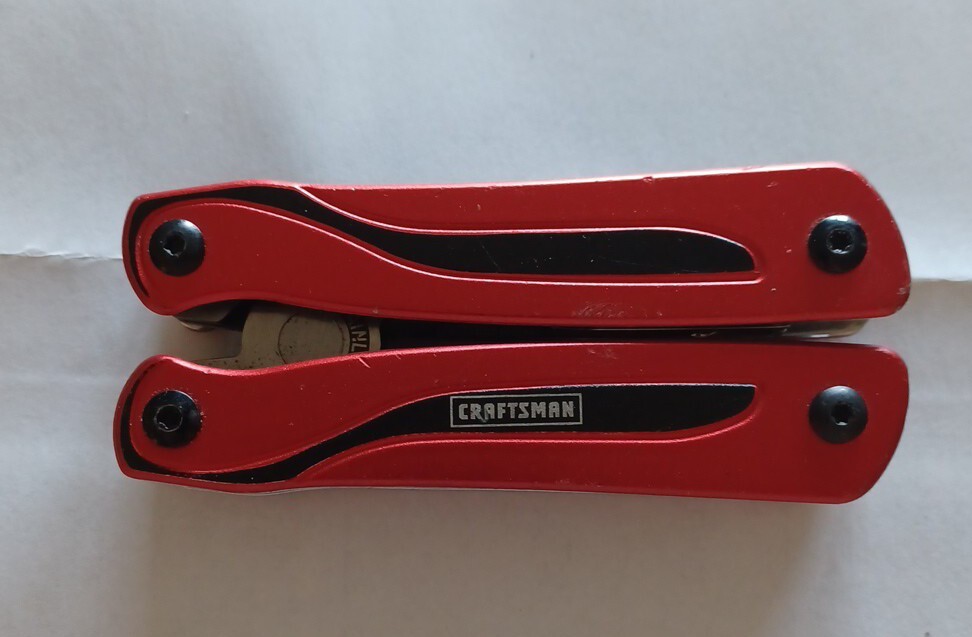 USED Craftsman 10 in 1 Multi Tool Pocket Knife Screwdriver Saw Bottle Opener RED