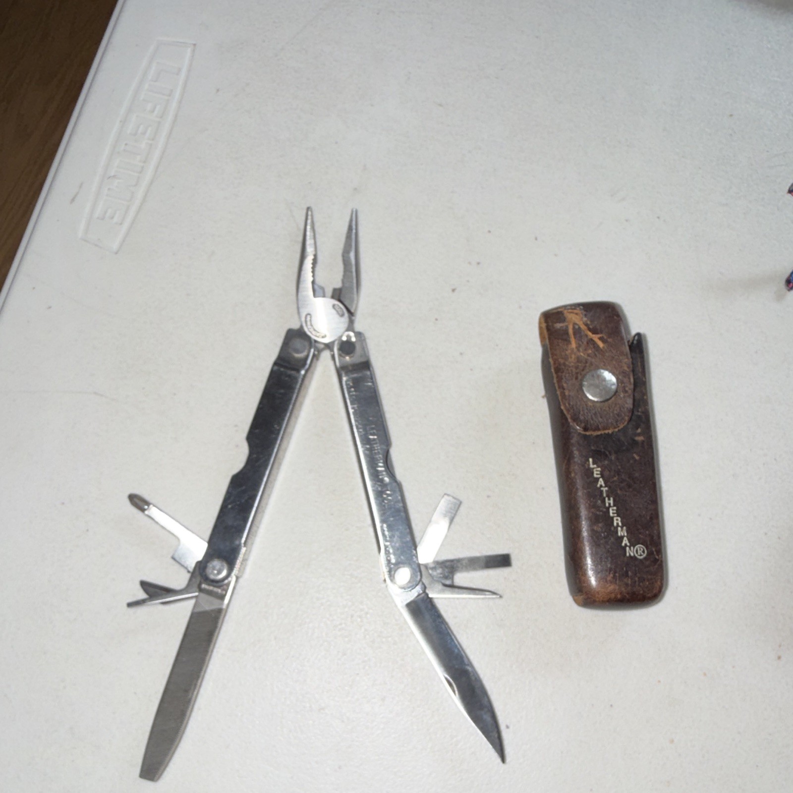 Leatherman Pocket Survival Tool Multi-Tool Pliers Knife File w/ Leather Sheath
