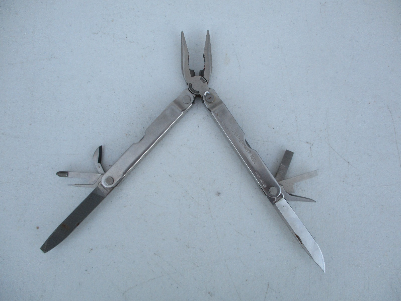 Leatherman Pocket Survival Tool USA Patent 1325473 w/ Leather Sheath Date 11/95