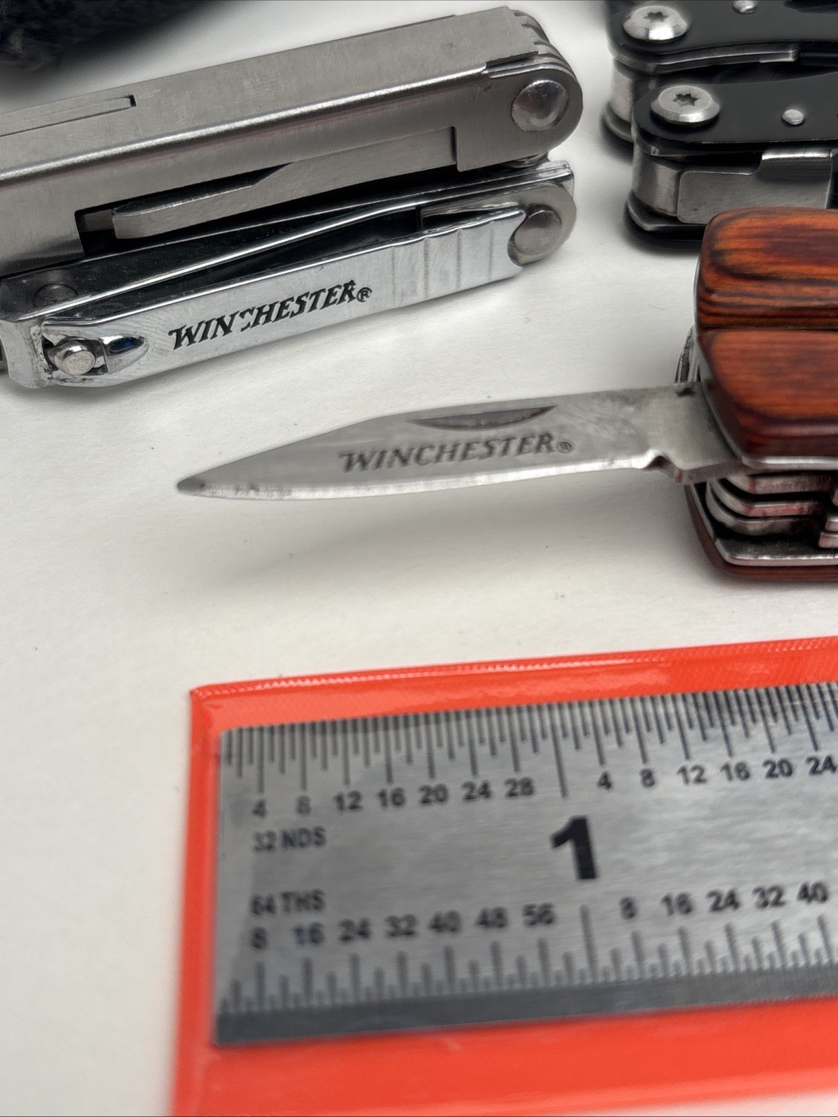 Lot Of 4 Different Function Multi-Tools Winchester Nail Clipper & Wood Grain