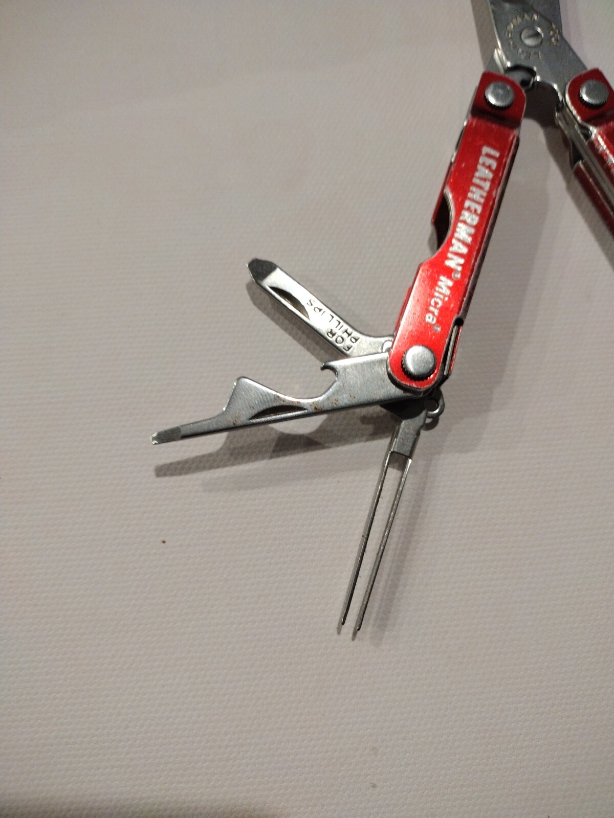 Leatherman Micra Multi-Tool, Knife, Scissors, Key Ring, Red Color in Good Condit