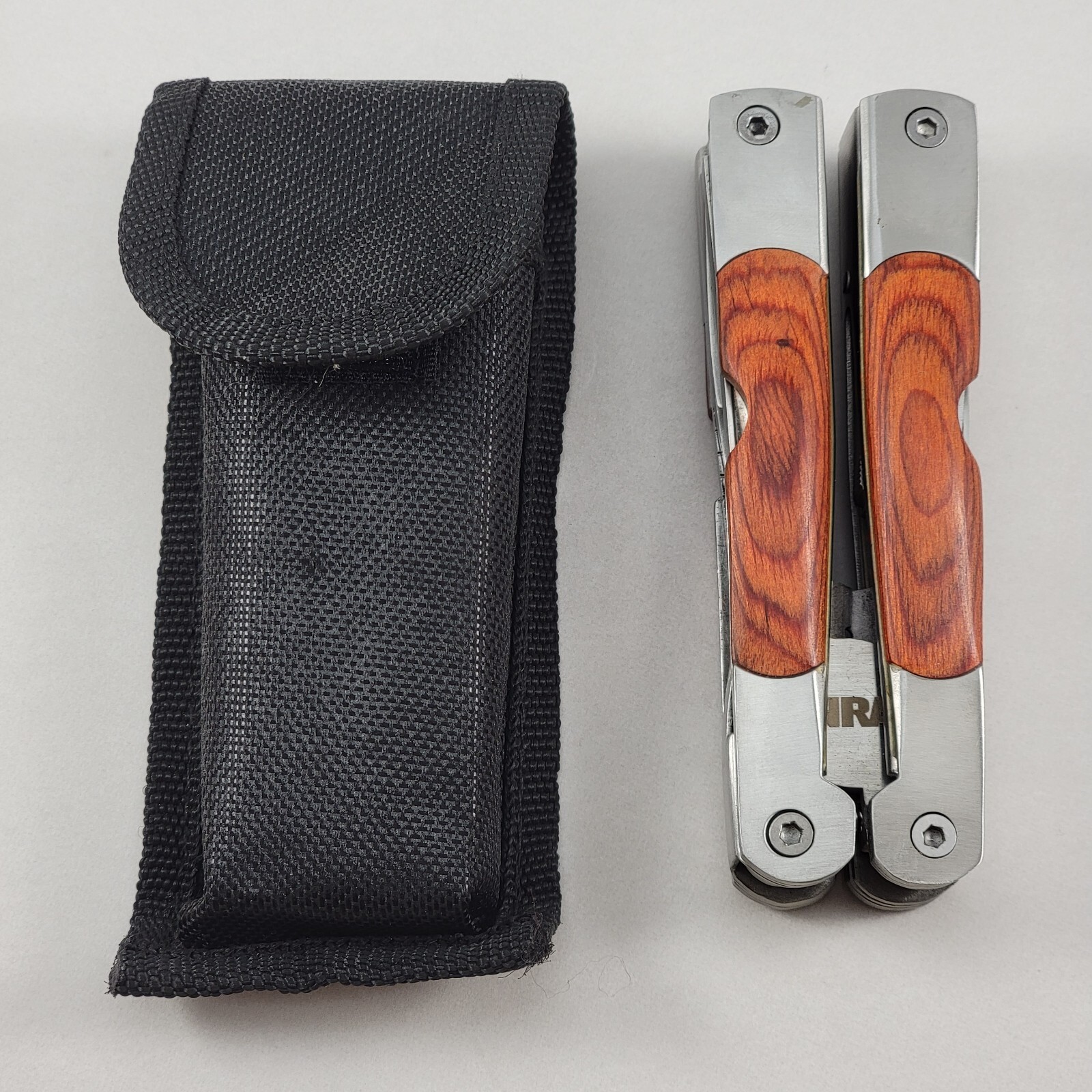 NRA Multi Tool – 4.5″ With Sheaf – Pliers, Knife, Can Opener & More – CLEAN