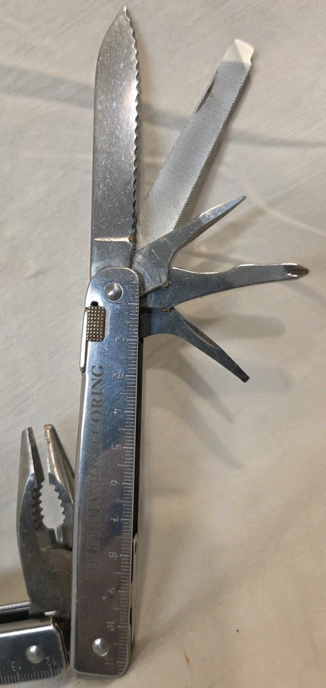 Victorinox SwissTool Swiss Army Knife Multi Tool Pliers, Ruler, Knife + used