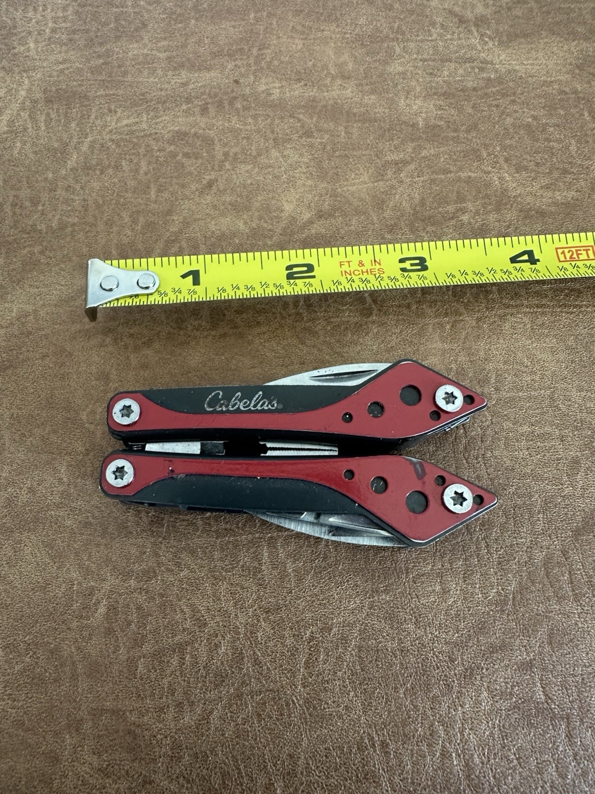 Cabela’s 4-1/2″ Multi-Tool in Red and Black with 7 Tools In One