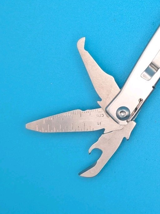 Leatherman Rev 3.8″ Multi-Tool, Stainless! *SOME RUST ON ITEM*