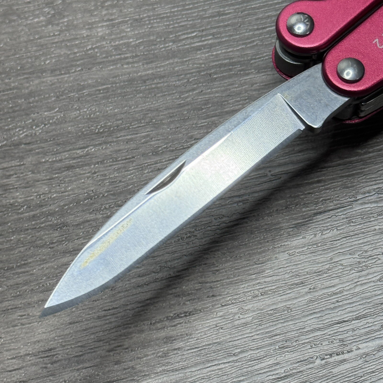TWO Leatherman Juice C2 Red multitools. TM variants. Discontinued