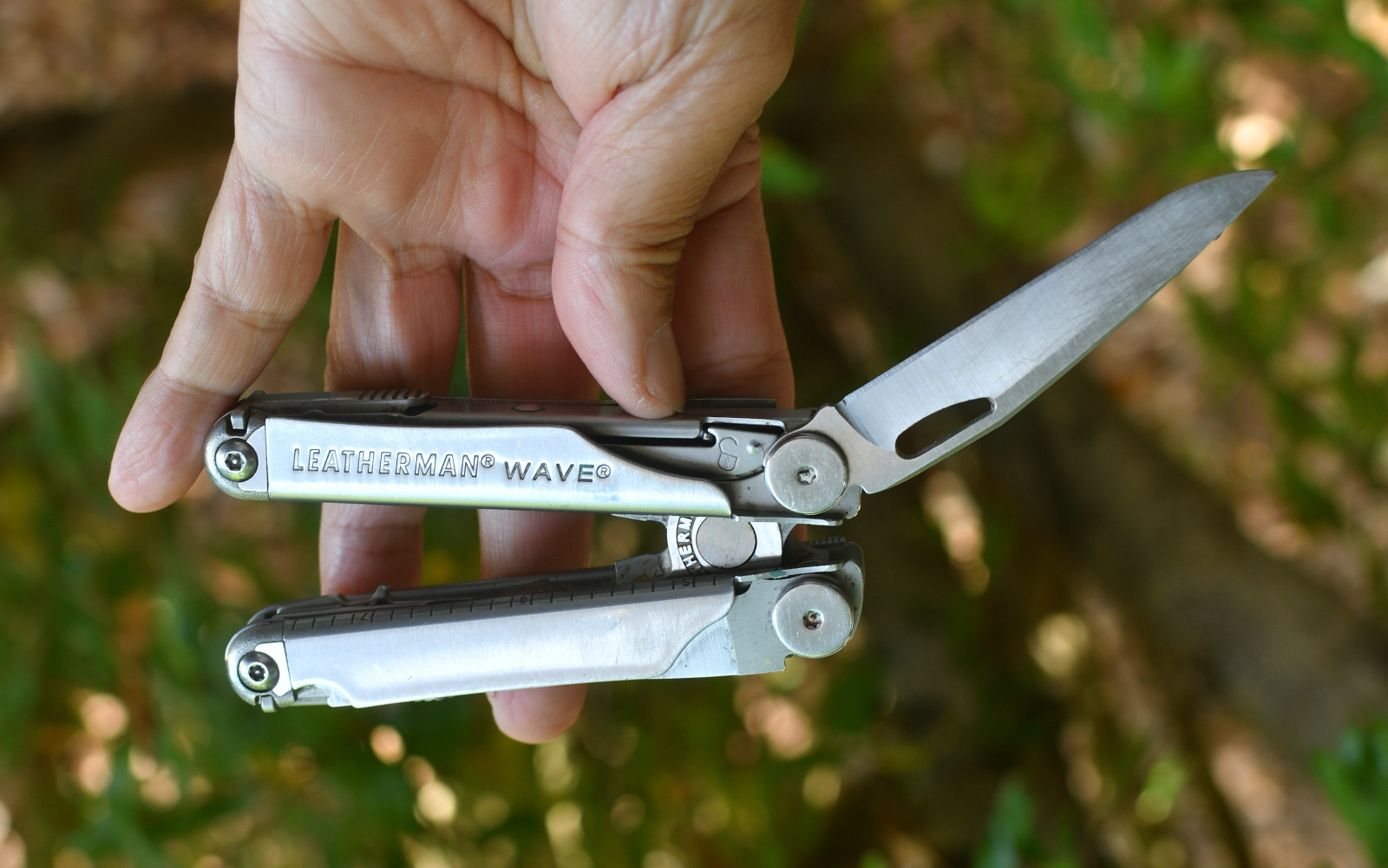 LeatherMan Wave Pocket Knife  Blades Rust