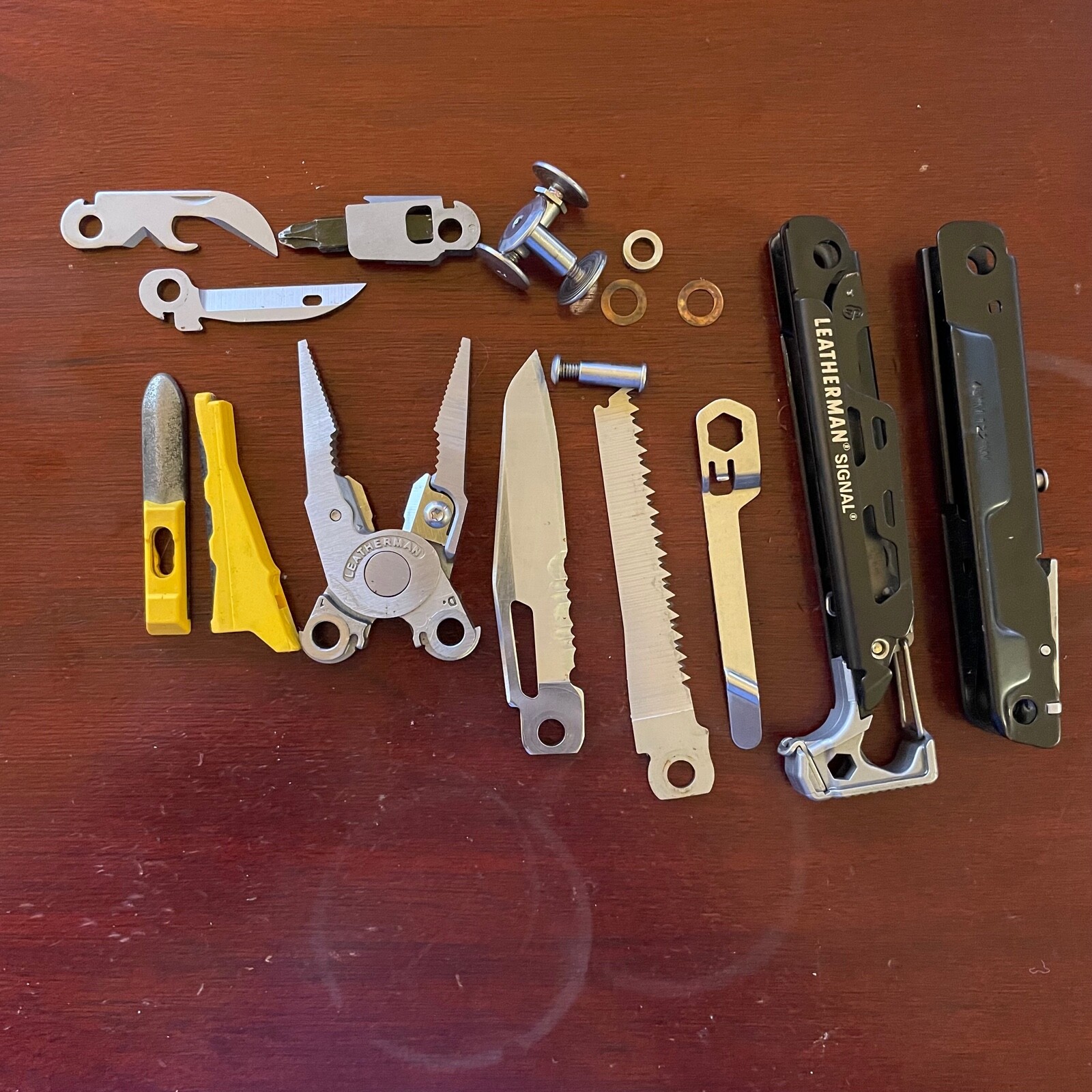 Parts from a Black & Stainless Leatherman Signal: One (1) part for Repair or Mod