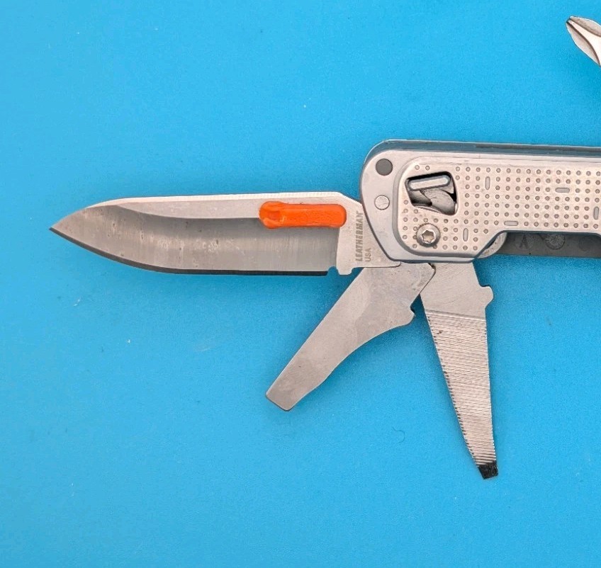 Leatherman FREE T4 Pocket Knife Multi-tool! Stainless! RETIRED!