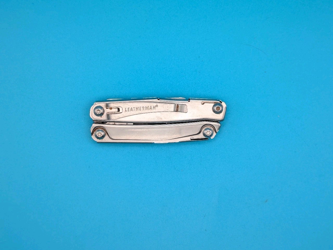 Leatherman Rev 3.8″ Multi-Tool, Stainless! *SOME RUST ON ITEM*