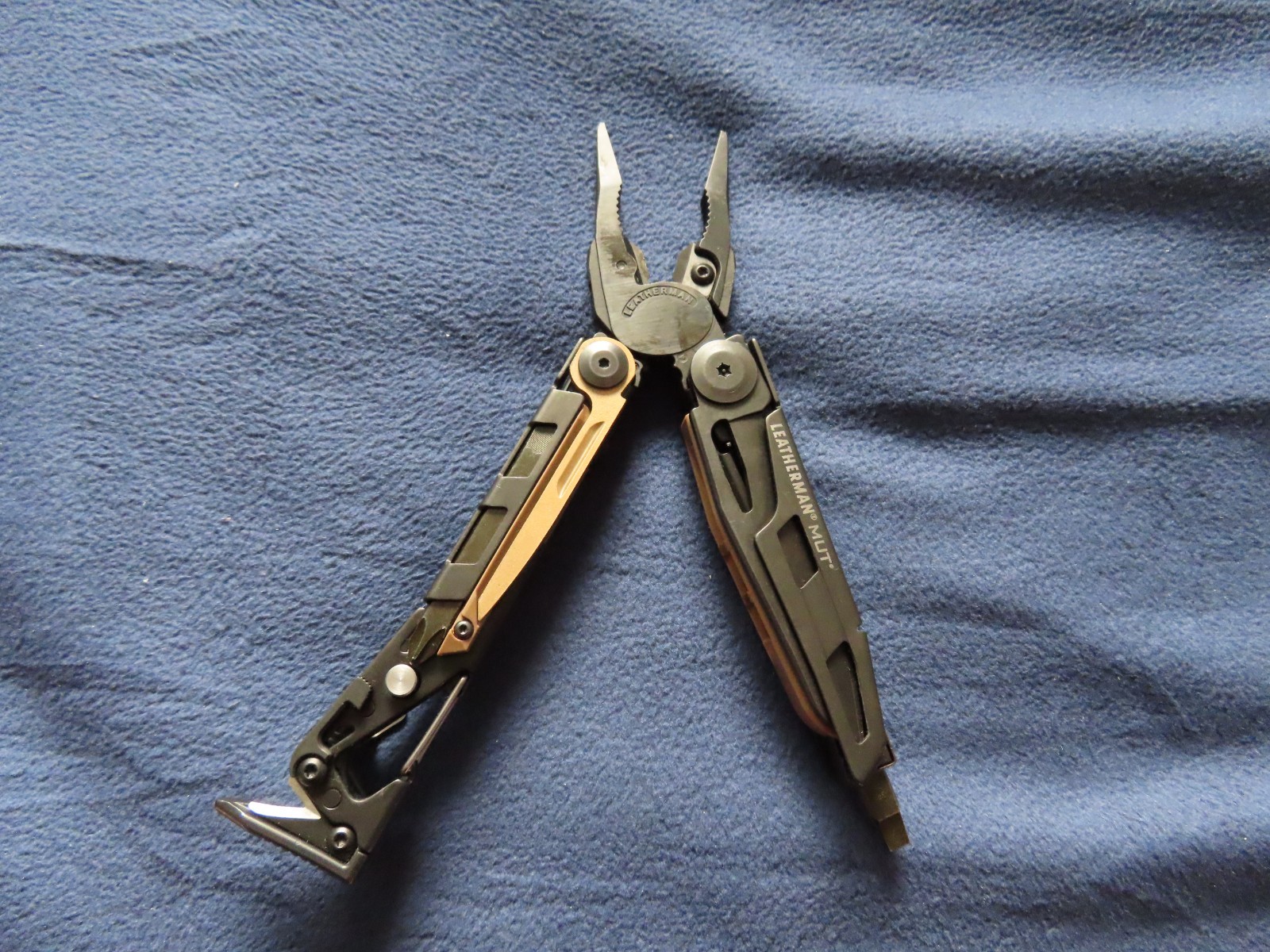 Leatherman MUT Black Titanium Clip multi tool brown sheath. 10/2011