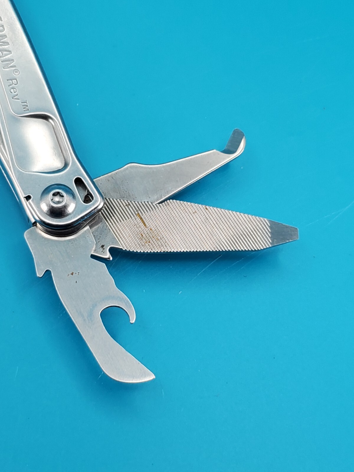 Leatherman Rev 3.8″ Multi-Tool, Stainless! *SOME RUST ON ITEM*