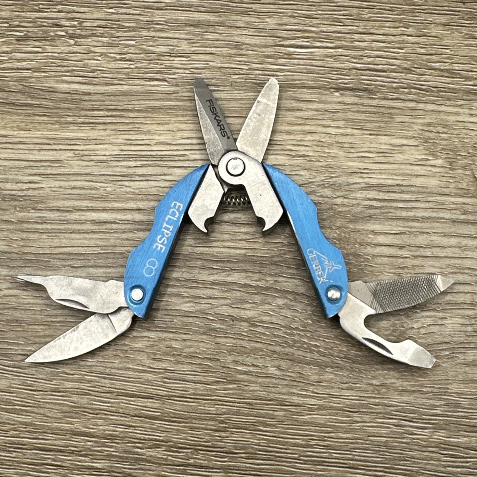 Gerber Eclipse Fiskars Multitool Scissors File Knife Screwdriver Bottle Opener