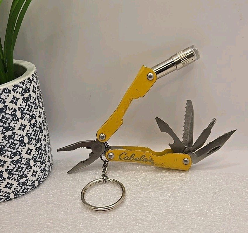Cabelas Pocket Multi-Tool Flashlight Serrated Knife Can Opener Pliers Keychain