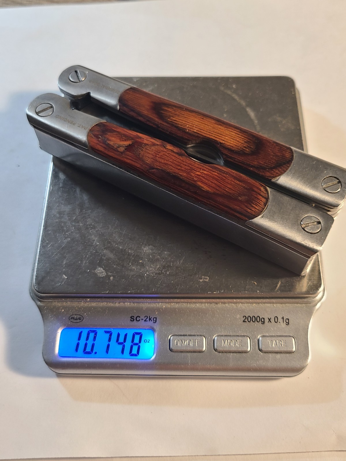Similar to Leatherman Multi-Tool Sheffield 2CR Wood Grain Handle 12 in 1 minty!