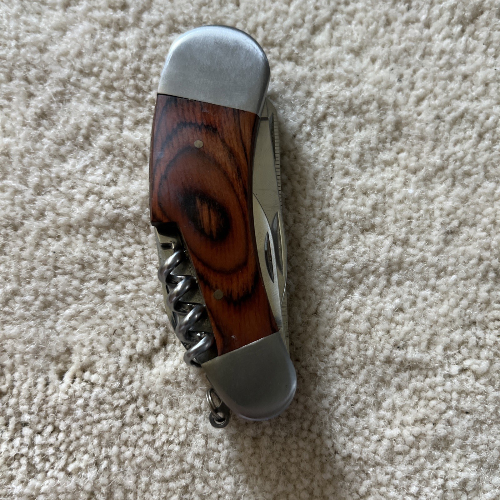 Camping Knife Wooden Handle with 7 Different Tools Attached with a Hanging Ring