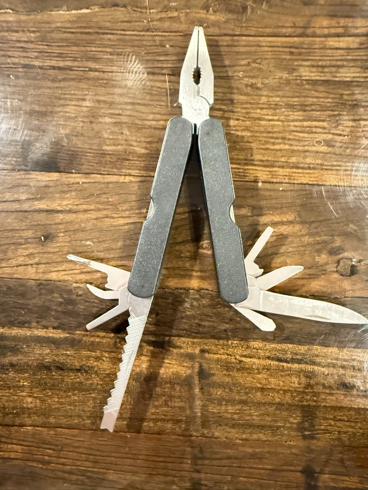 12 Multi-Tool w/ Pliers Pocket Knife, Saw.