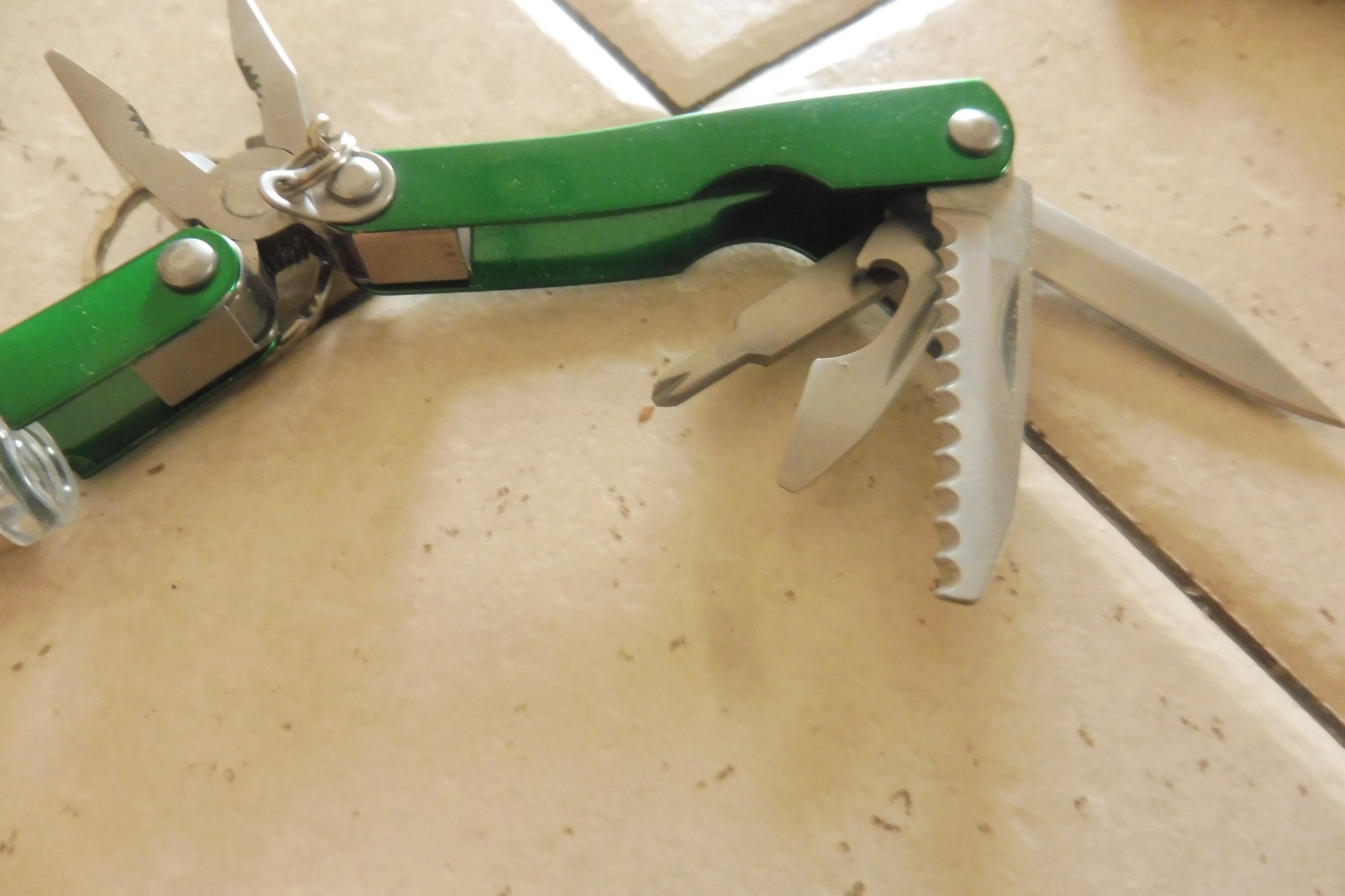 CABELA’S SMALL 7 FUNCTION MULTI-TOOL W/ LIGHT & NYLON SHEATH