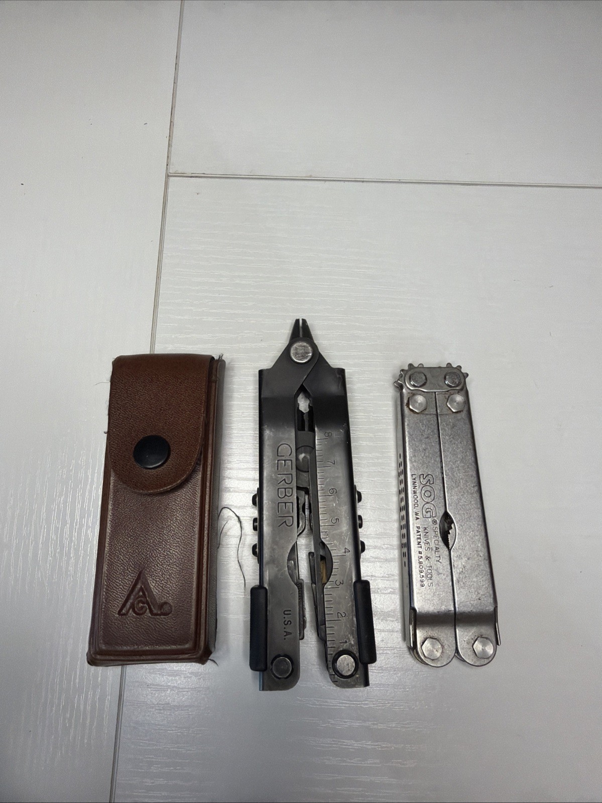 Lot Of 3 Multi Tools Gerber, American Camper, SOG.