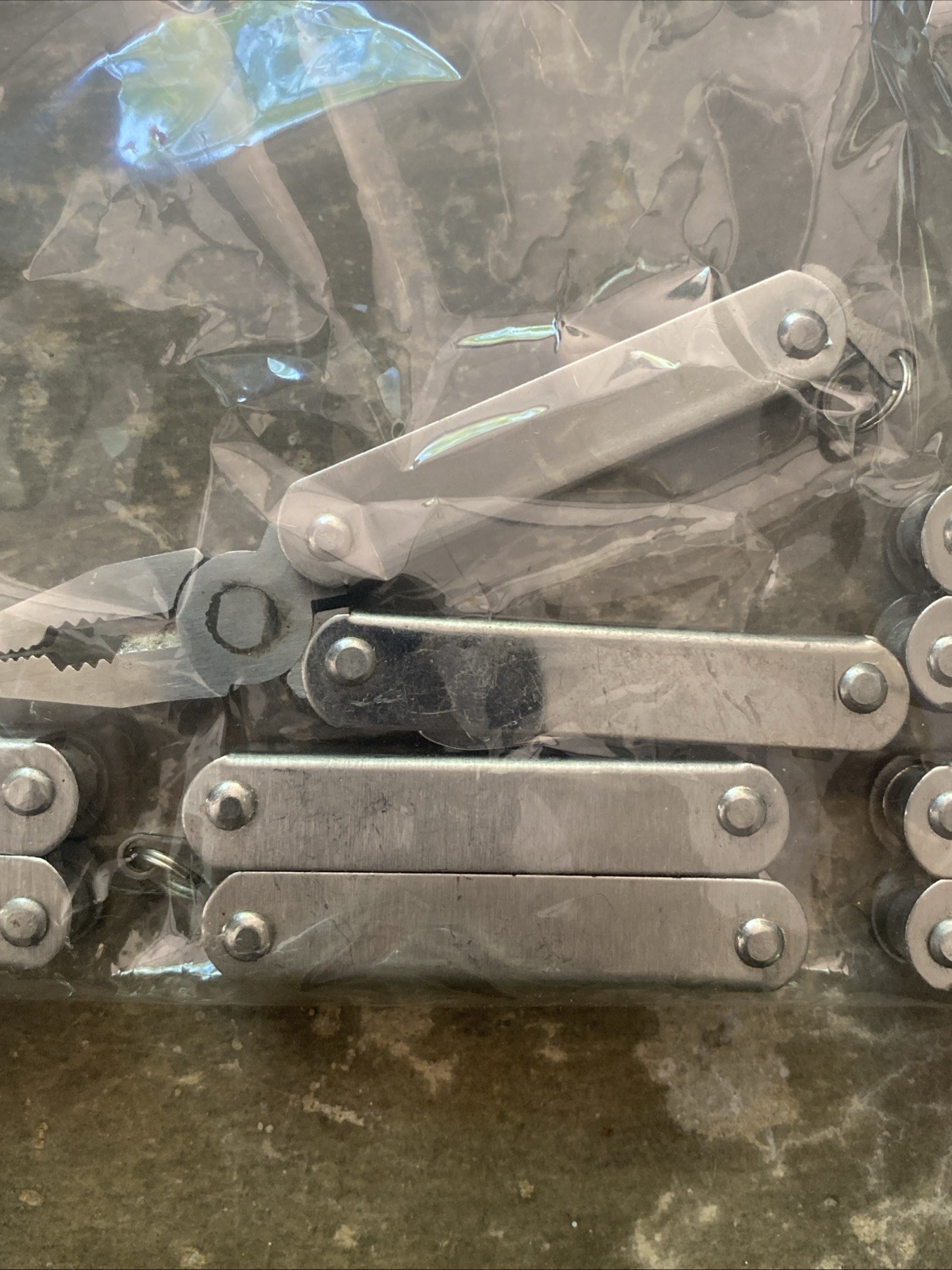 5 Unbranded Folding Pocket Multi Use Tool, Used Good Condition