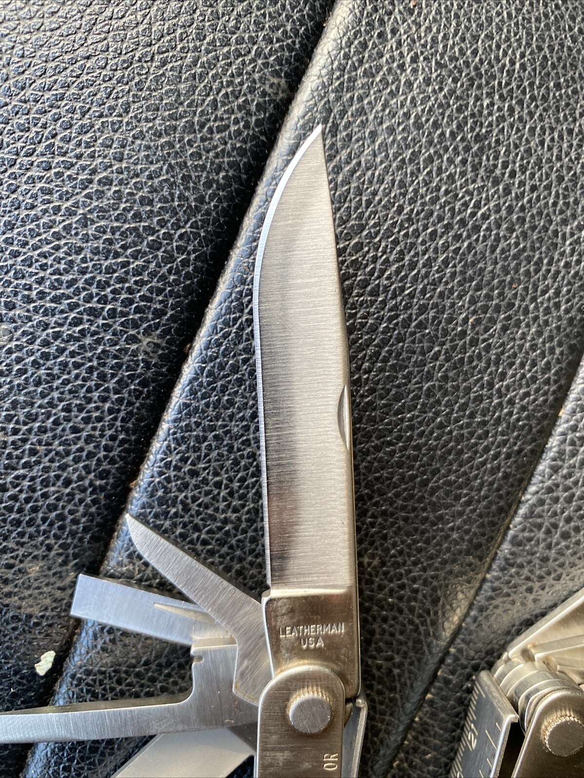 Multi-tool With Pocket Clip. Leatherman 832127 Rev Stainless Steel