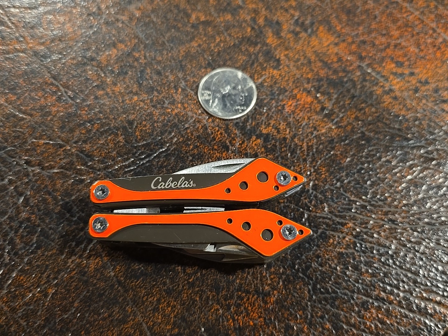 Cabela’s Multi-Tool 7 Tools in 1 Stainless Steel Neon Orange Knife Blade, Pliers