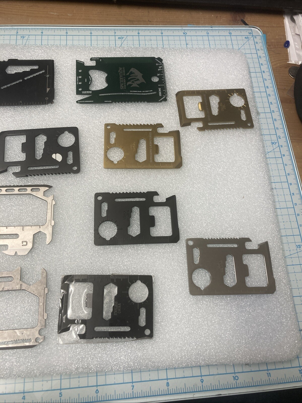 10 USED Various/Multicolor TSA Confiscated Metal Survival Wallet Cards. A STEEL!