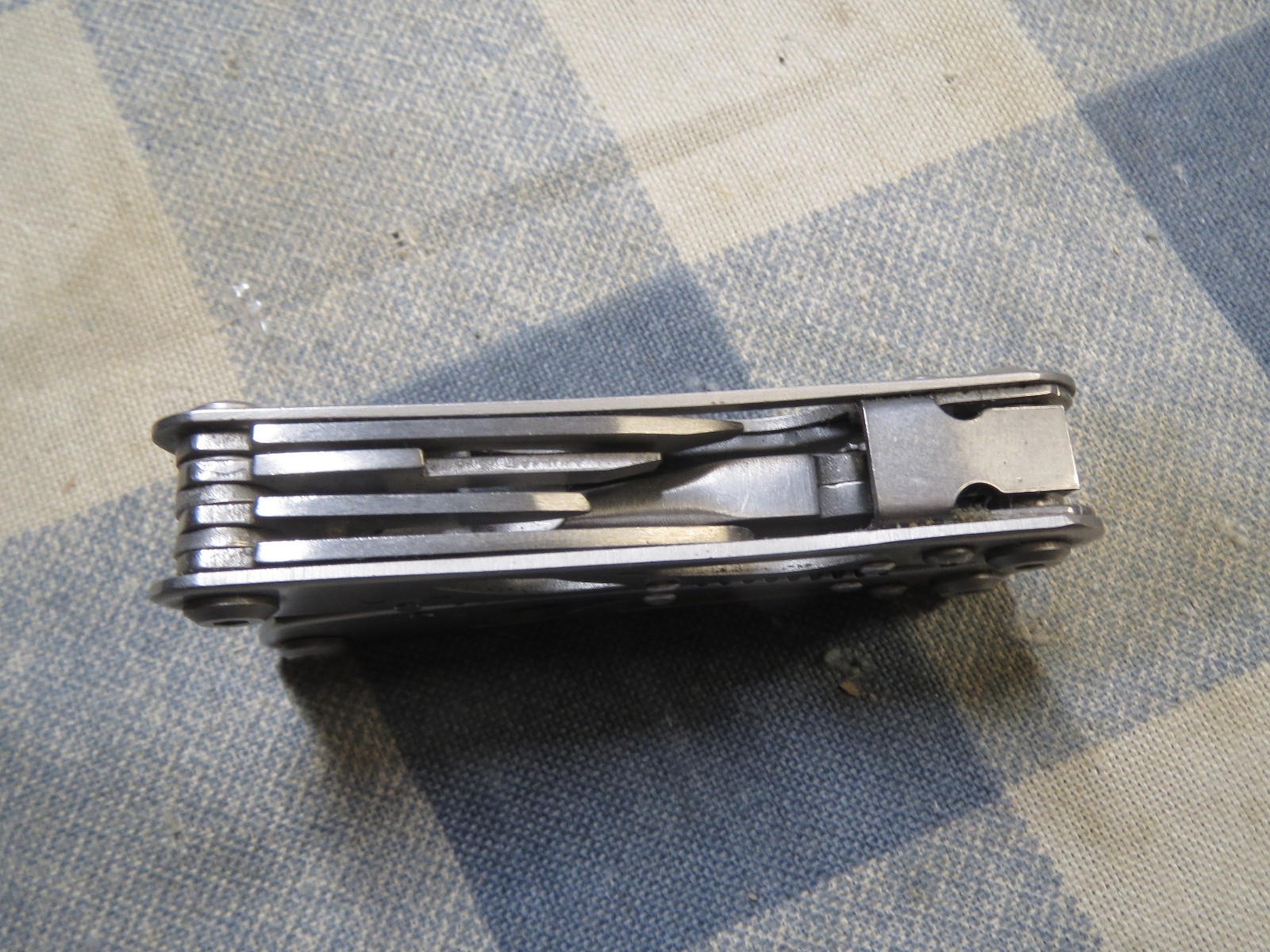 Used Small Stainless Multi-Tool 2 13/16 inch folded length