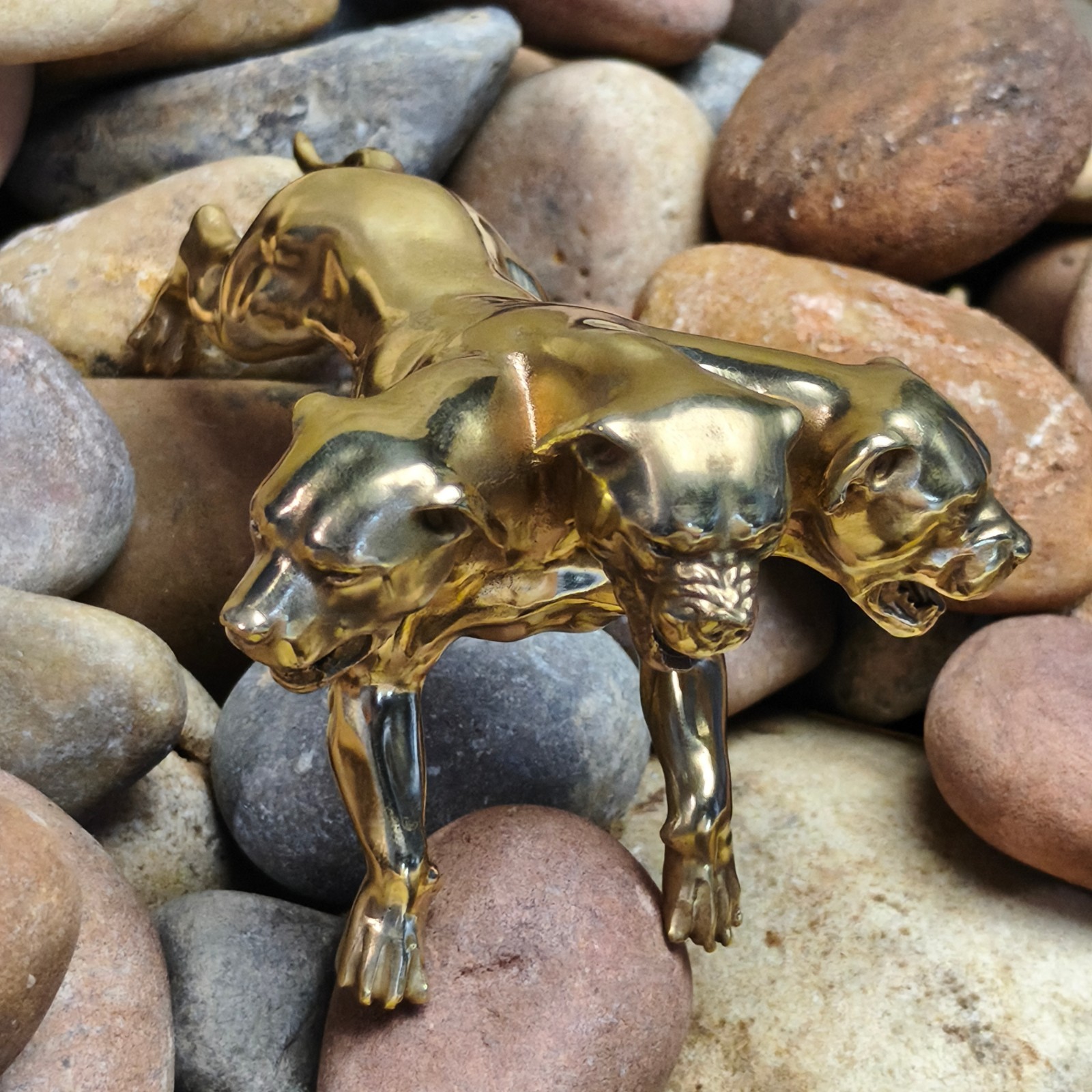Purple copper sculpture Cerberus hellhound three head animal canine monster dog