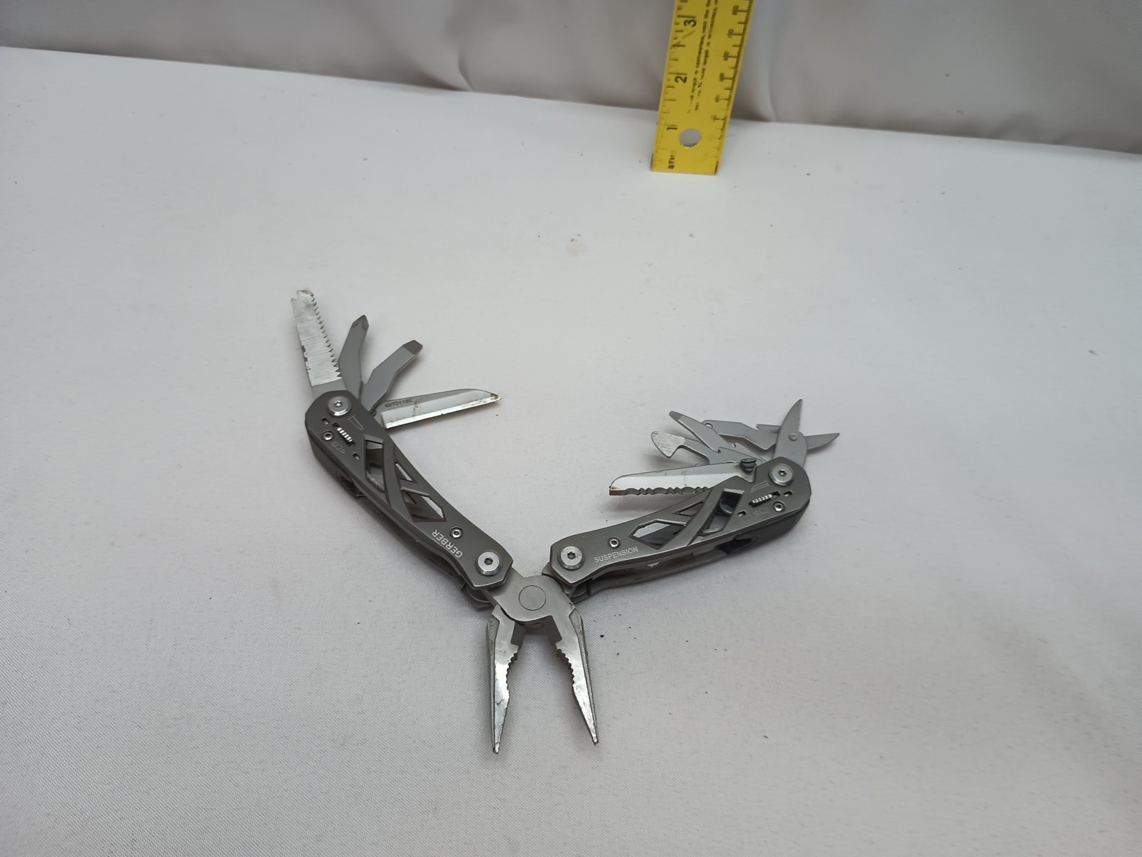 One Gerber Suspension 897011BE 8 Tools Plus Pliers