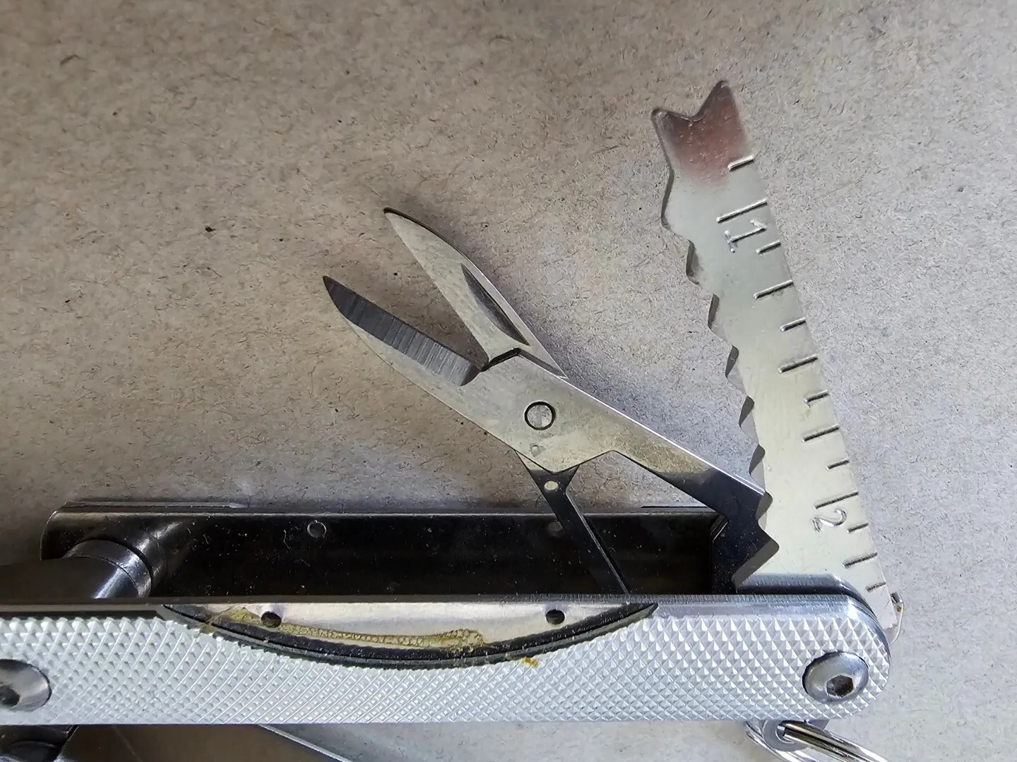 Pocket Multi-Tool with 9 Tools – Pliers Cutters Opener Flat Head Scissors Knife