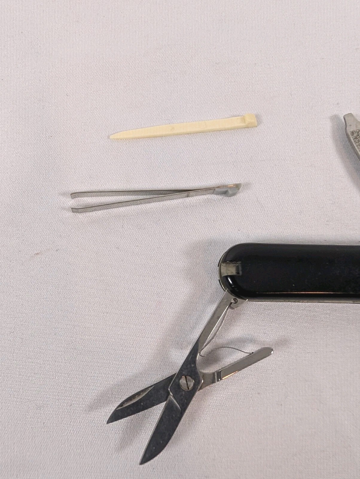 Victorinox Black Multi-Tool Pocket Knife, 5 Tools, Straight Edge Stainless Steel