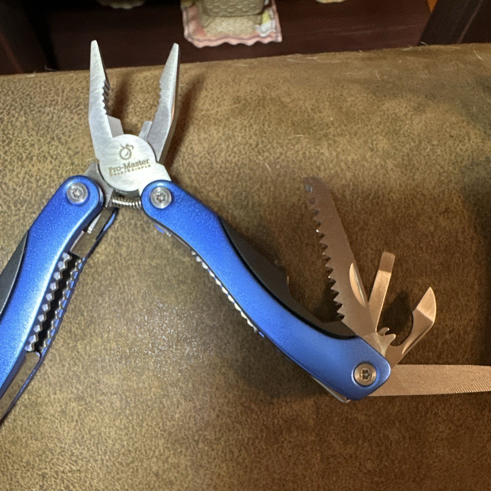 Pro-Master Blue Multi-Tool with Pliers, Partially Serrated Blade & Sheath