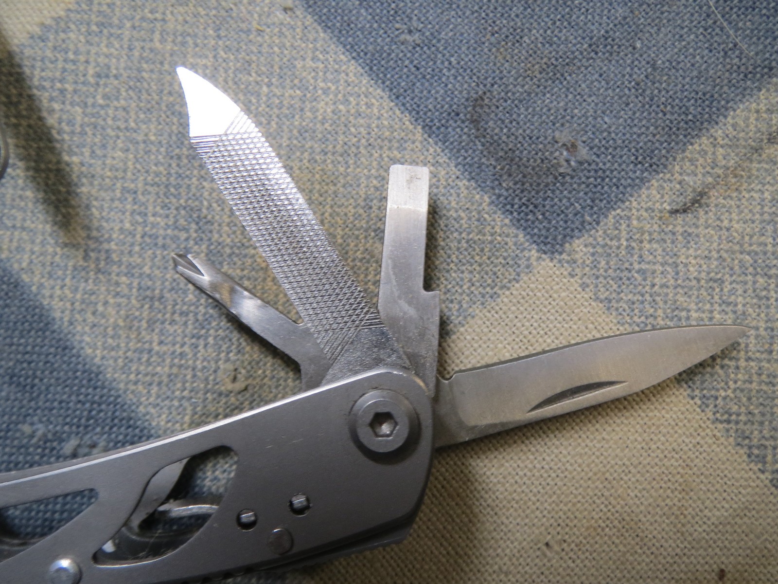 Used Small Stainless Multi-Tool 2 13/16 inch folded length