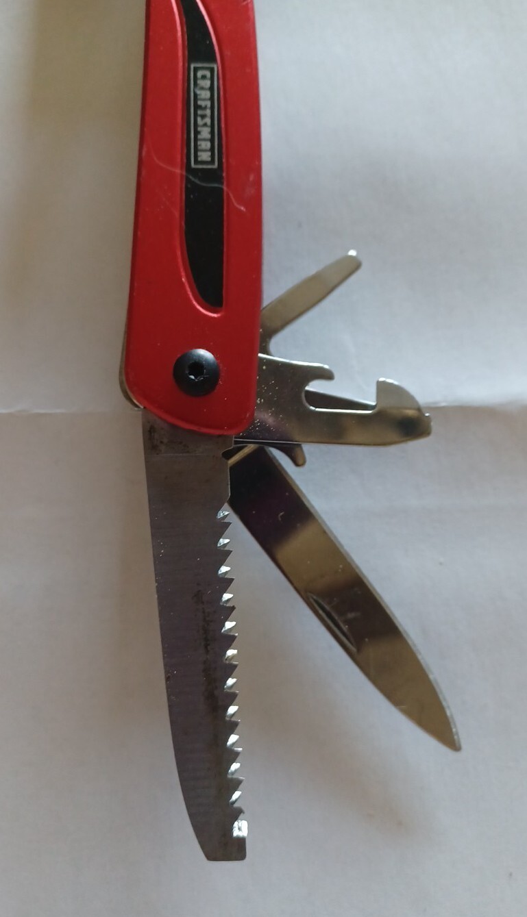 USED Craftsman 10 in 1 Multi Tool Pocket Knife Screwdriver Saw Bottle Opener RED
