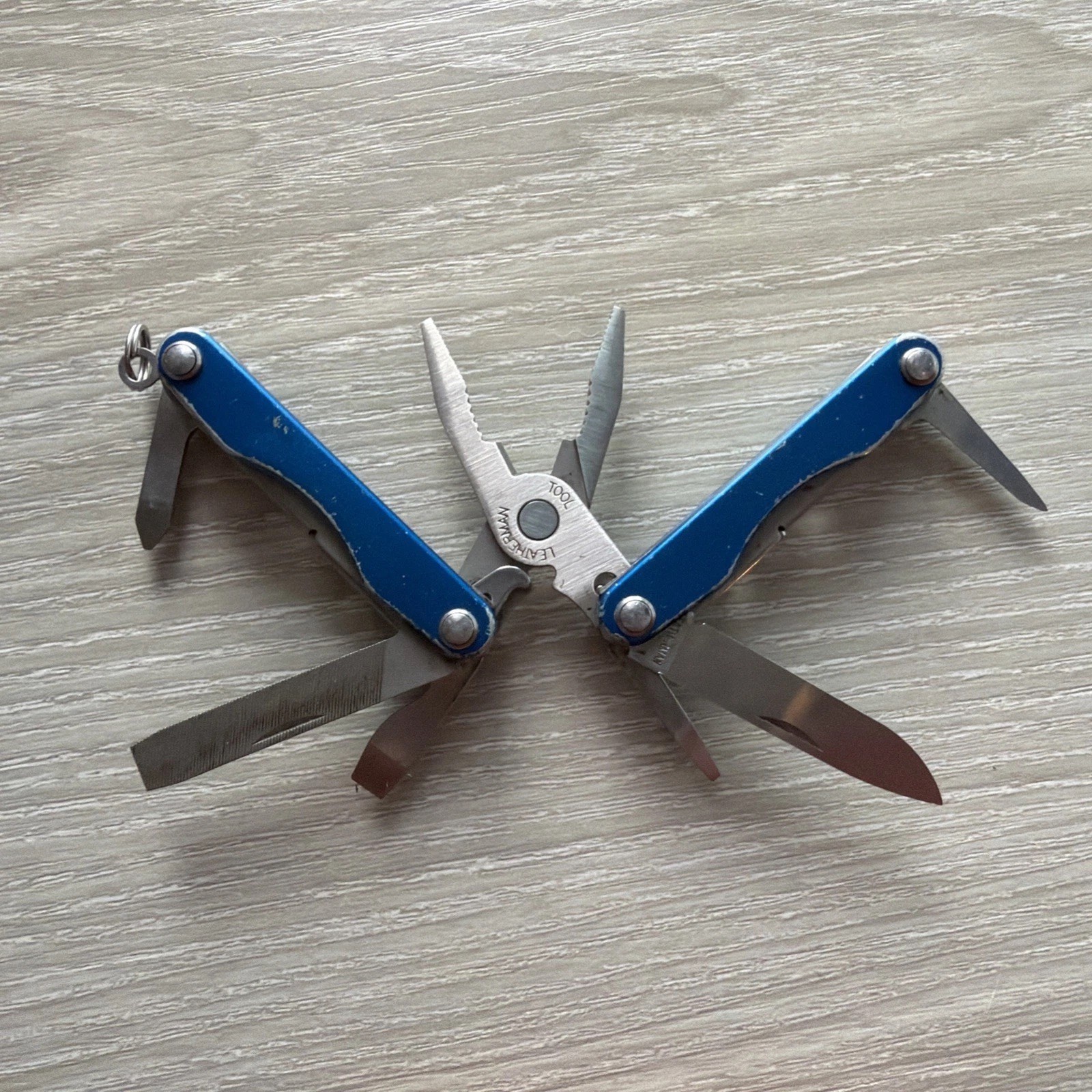 Leatherman Squirt P4 MultiTool Plier Knife File Drivers Blue Metallic
