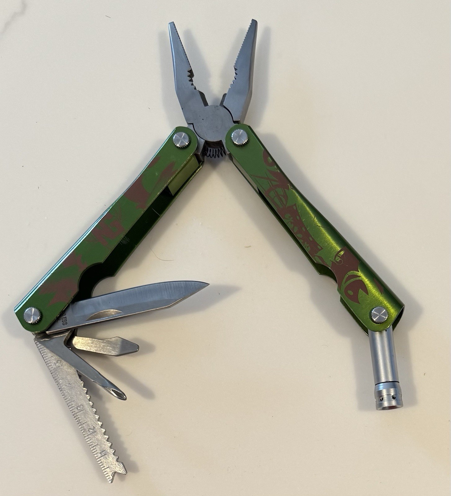Multitool w/ Pliers Knife Screwdrivers Bottle Opener Saw Ruler Sheath Flashlight