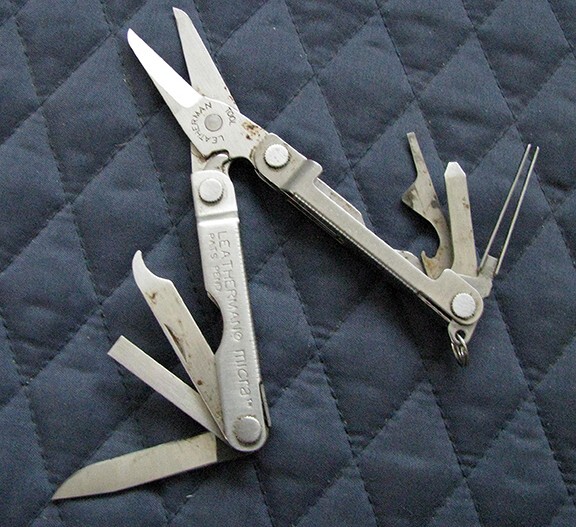 Letherman Multi mini Tool with case.