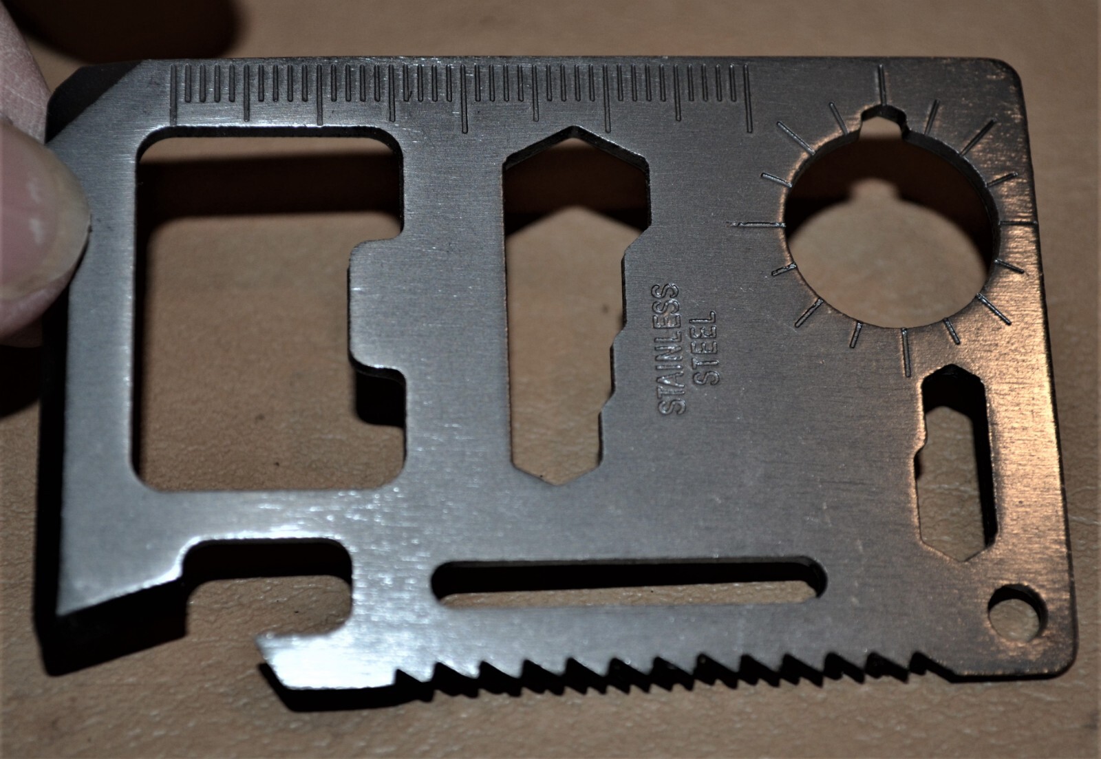 Smallish Wallet Size Multi Survival Tool in Gun Metal Color in Black case Metal