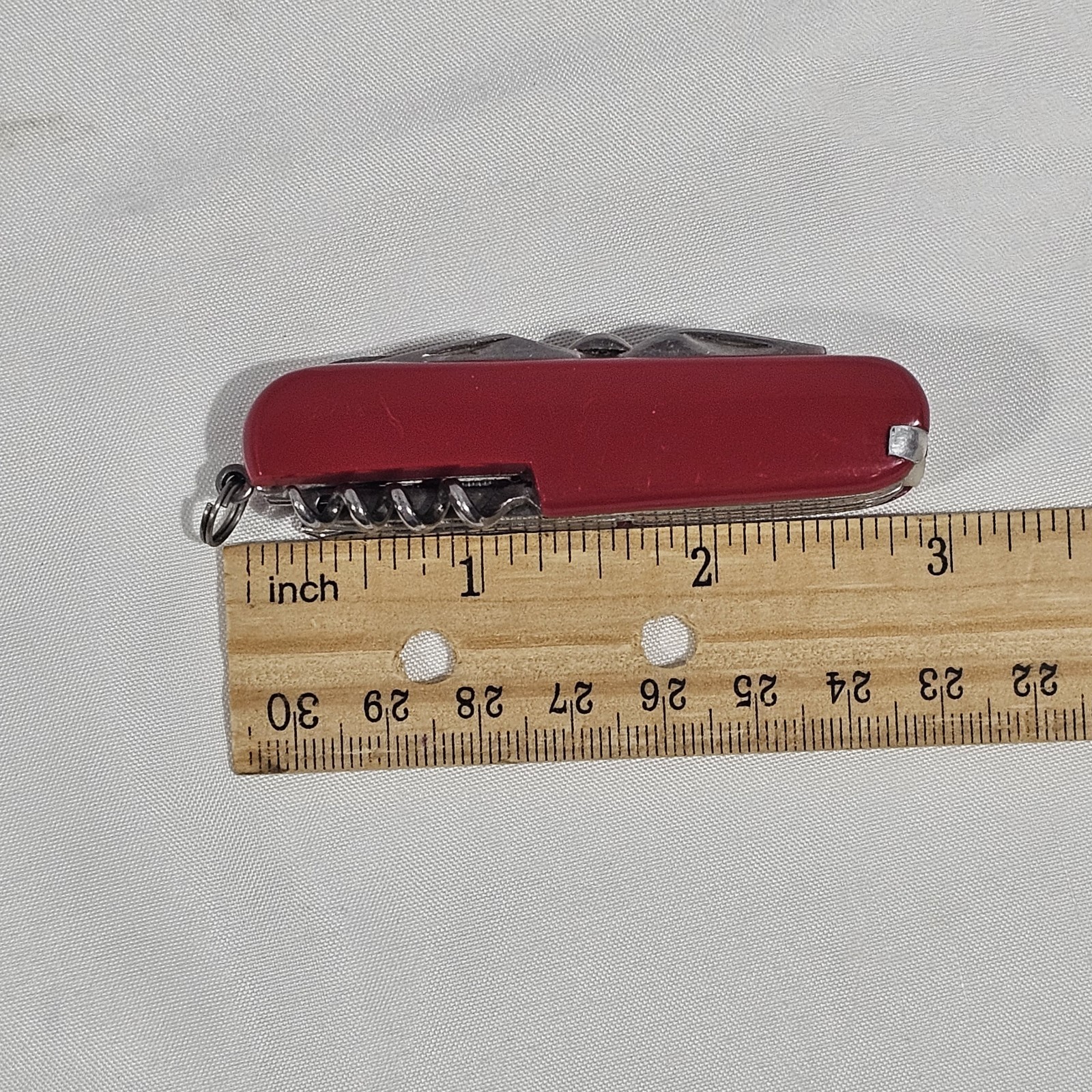 Red Multi-Tool Knife with Scissors, Serrated Knife, Corkscrew, Bottle Opener