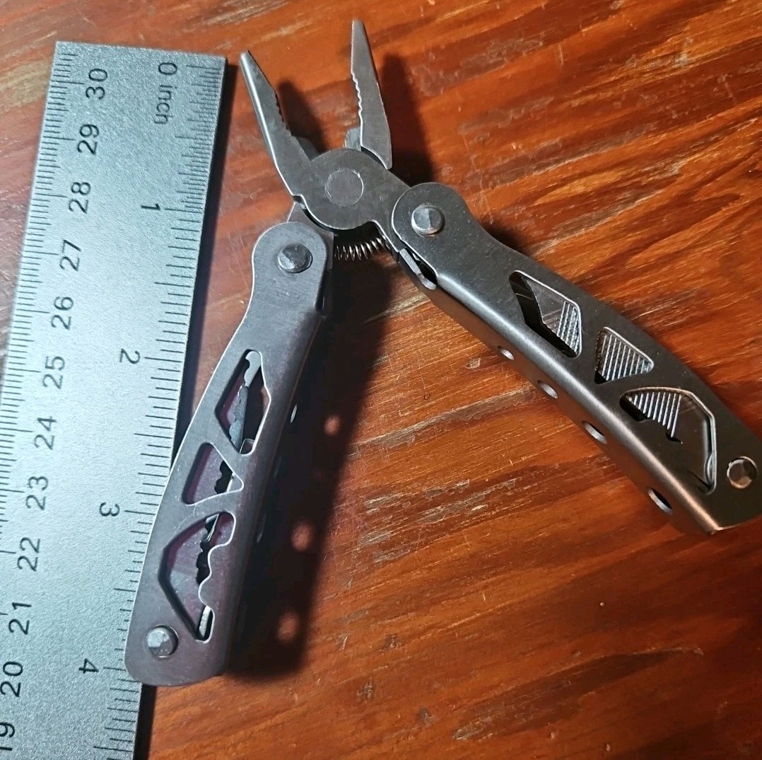 New! Stainless Steel Multi tool, Pliers, Wire Cutters, Screwdrivers, etc….