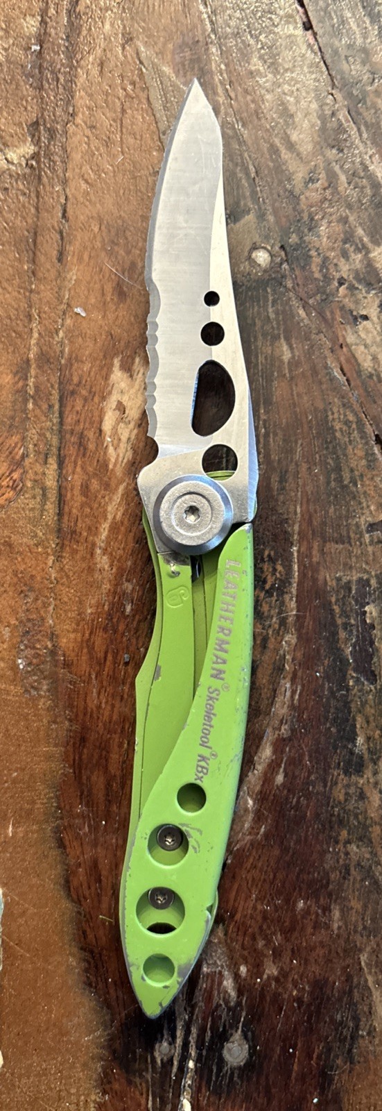 LEATHERMAN Skeletool KBX Multitool, Stainless Steel Lime Green 1/2 Serrated Edge