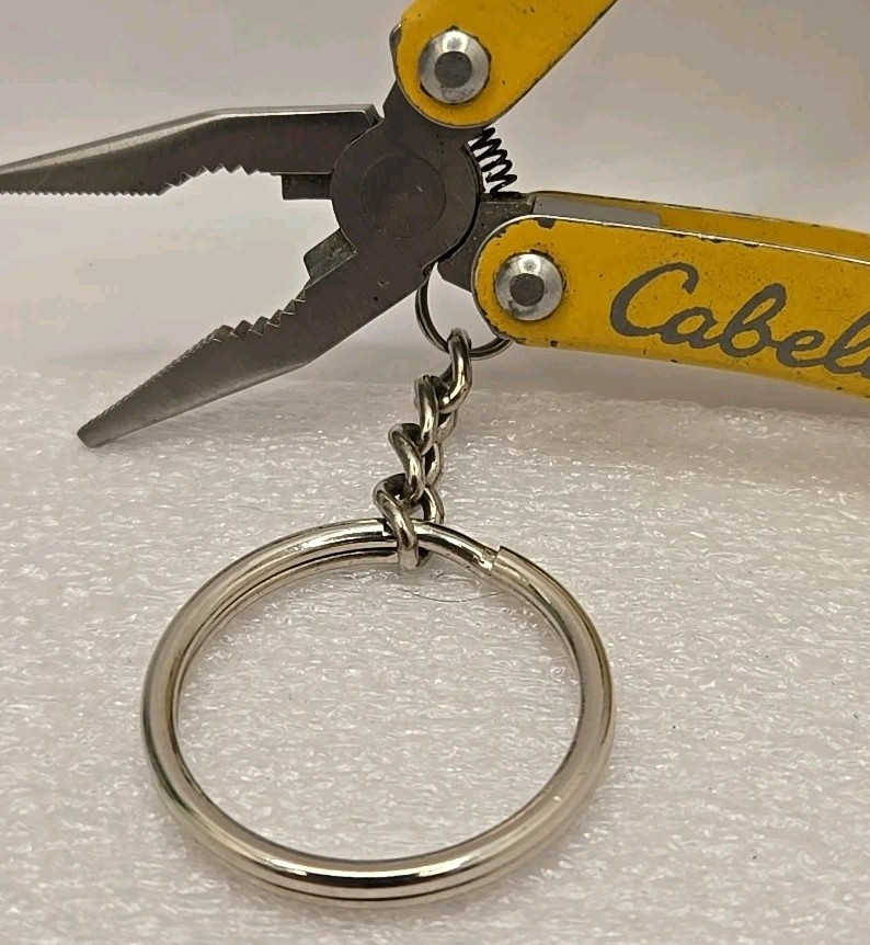 Cabelas Pocket Multi-Tool Flashlight Serrated Knife Can Opener Pliers Keychain
